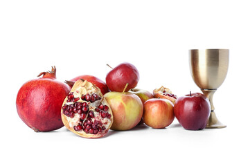 Sacramental goblet of wine and fruits on white background. Rosh hashanah (Jewish New Year) celebration