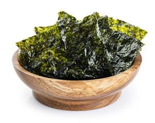 Wooden bowl with crispy nori seaweed korean snack isolated on white background. With clipping path. © vitals