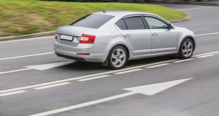 Car are accelerating along the road.