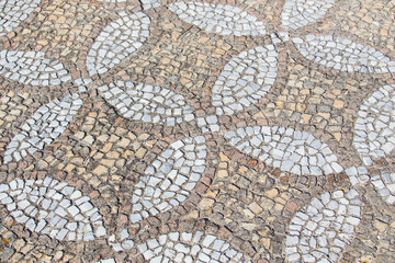 Vintage mosaic pattern on the sidewalk