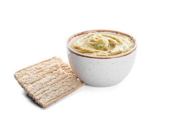 Bowl with tasty baba ghanoush and crackers on white background