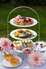 English afternoon tea with cakes and sandwiches