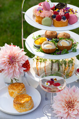 English afternoon tea with cakes and sandwiches