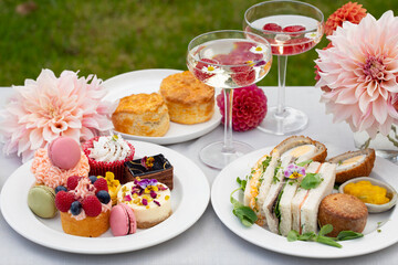 English afternoon tea with cakes and sandwiches
