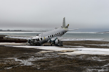 Wreck of soviet military plane Ilyushin Il-14 which crashed at Heiss Island, Franz Jozef Land archipelago.  - obrazy, fototapety, plakaty
