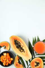 Fresh ripe papaya on white table, space for text