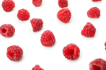 Flat lay composition with red juicy raspberry, isolated on white background