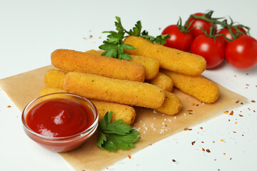 Concept of tasty food with cheese sticks on white background