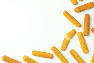 Cheese sticks on white background, space for text