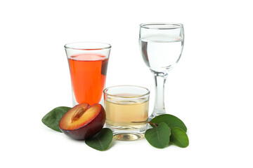 Plum alcohol shots isolated on white background