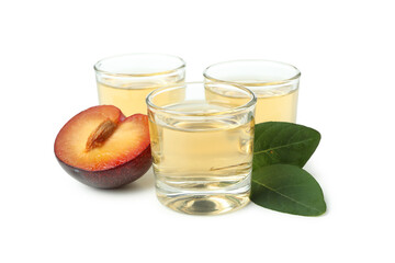 Plum vodka shots isolated on white background