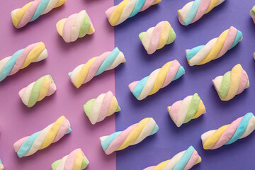 Tasty marshmallows on color background, closeup