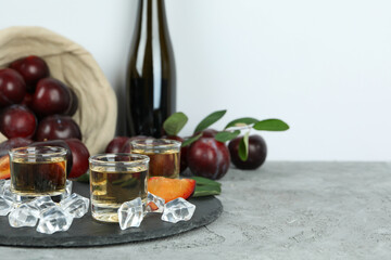 Concept of alcohol with plum vodka, space for text - obrazy, fototapety, plakaty