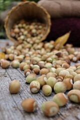 autumn flatlay with hazelnuts on rustic wooden table