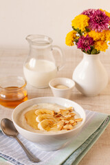 Semolina pudding with bananas, honey and roasted almonds