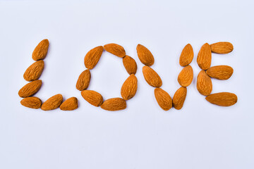 Almond nuts in the form of love. Valentine's day concept. 
