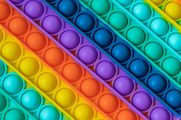 Rainbow Fidget Toys Pop it background and texture. Push Pop Bubble toy for kid.