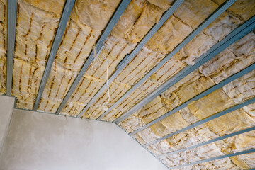 insulation of the attic with glass wool