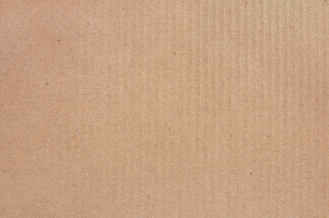 Cardboard sheet texture background, detail of recycle brown paper box pattern.