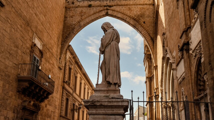 Side view of Statue of St. Francis of Paola at the Cathedral of Palermo, Sicily, Italy. - obrazy, fototapety, plakaty