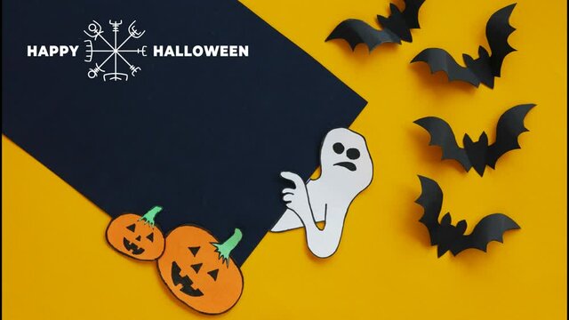 Halloween background. Animated image of witch runes and happy halloween lettering. The ghost points to a place for text, silhouettes of bats, pumpkins. 4K