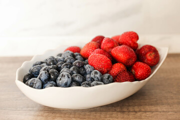 Blueberries and strawberries in a bowl