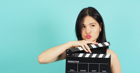 Clapper board or movie clapperboard in teenage girl or woman hand.it use in video production ,film,...