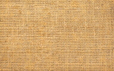 Brown burlap with beautiful canvas texture of brown fabric in retro style for placing advertising...