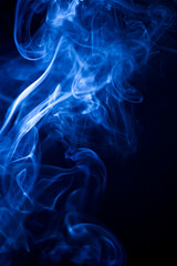 Motion blue smoke on black background.