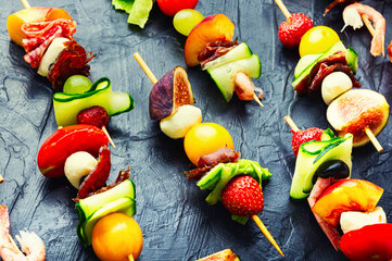 Easy snack from vegetables, fruits, meat and seafood