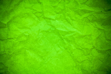 Obraz na płótnie Canvas Green paper crumpled texture background.