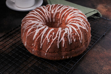 Pumpkin Bundt Cake Topped with Cream Cheese Glaze.
