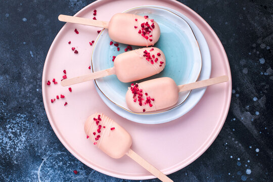 Cake Popsicles. Raspberry White Chocolate Ice Cream Pops. Homemade Cakesicles.