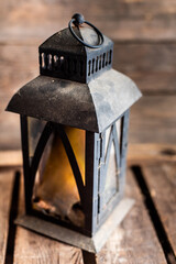 old lantern on a wooden background