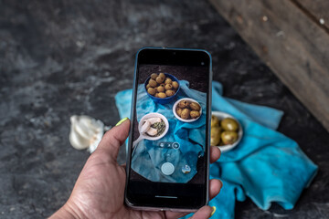 mobile food photography, photo of a phone taking a photo of food
