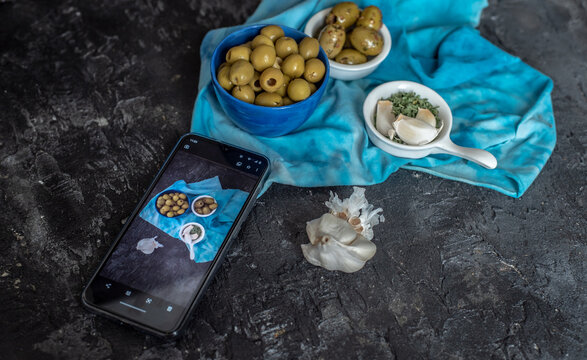 mobile food photography, photo of a phone taking a photo of food