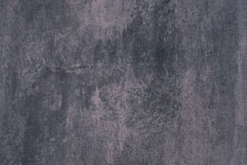 Black or dark gray rough grainy stone texture background