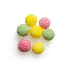Isolated round multicolored candies on white background