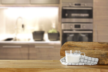 Desk of free space and kitchen interior. 