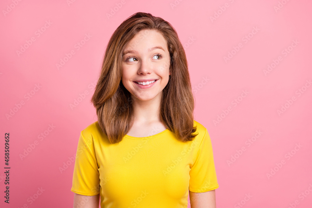 Wall mural Photo of young cheerful girl happy positive smile think curious look empty space isolated over pink color background