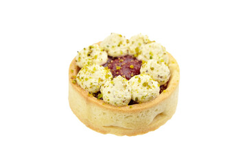 Sweet mini tart with pistachio and raspberry isolated on white