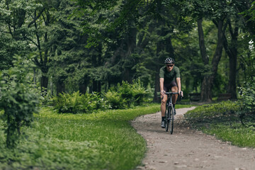 Cyclist in sport clothes having morning workout