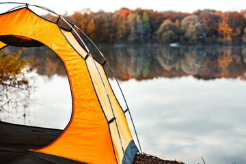 tent at the beach of the lake autumn fall season