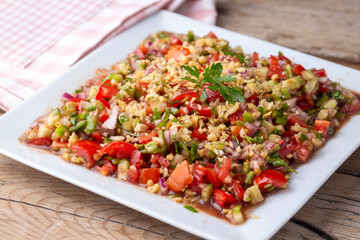 Traditional delicious Turkish cuisine, salad with tomatoes, cucumbers (Turkish name; Gavurdagi - gavur dagi salata)