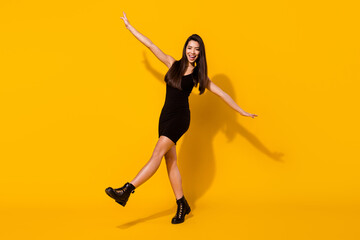 Full body photo of impressed brunette hairdo young lady fly wear black dress shoes isolated on...