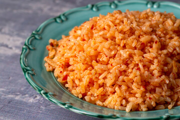 Traditional delicious Turkish food; rice pilaf with tomatoes (Turkish name; Domatesli pirinc pilavi)