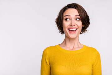 Fototapeta premium Photo of young curious girl happy positive smile amazed excited look empty space isolated over grey color background