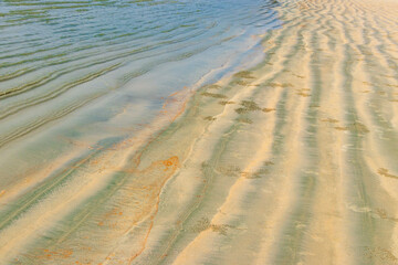 Wavy sandy soil island Koh Phayam Aow Yai Beach Thailand.