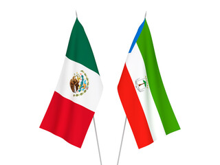 National fabric flags of Republic of Equatorial Guinea and Mexico isolated on white background. 3d rendering illustration.