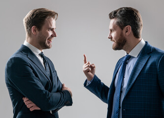 two angry businessmen arguing having struggle for leadership, misunderstanding.